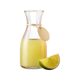Fresh lime juice in a small glass carafe with a lime wedge