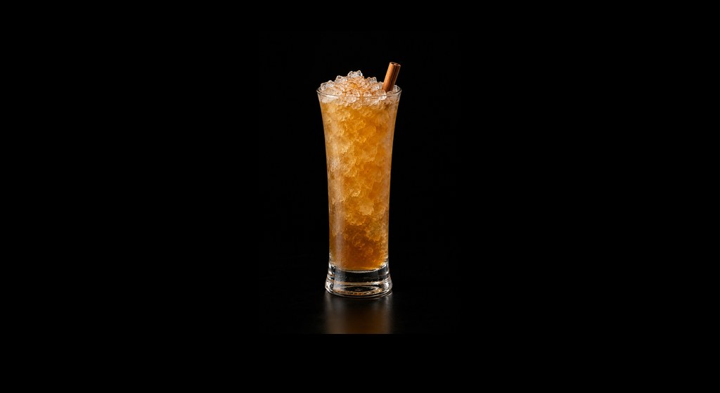 151 Swizzle cocktail on a dark studio background