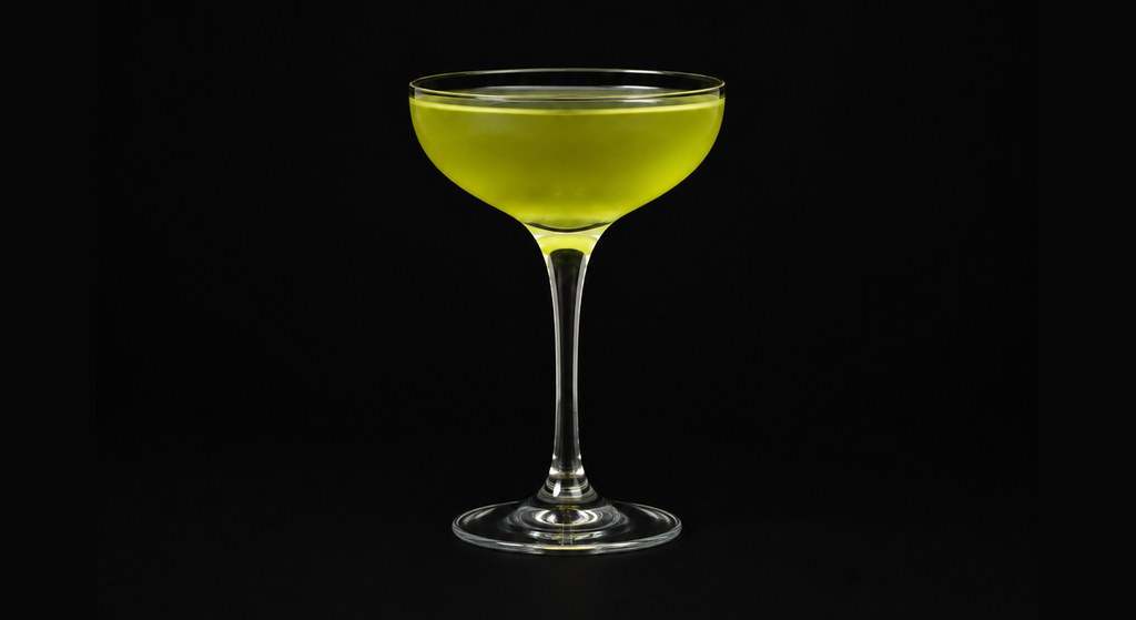 Adam's Words cocktail on a dark studio background