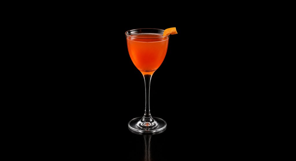 Adriatique cocktail on a dark studio background