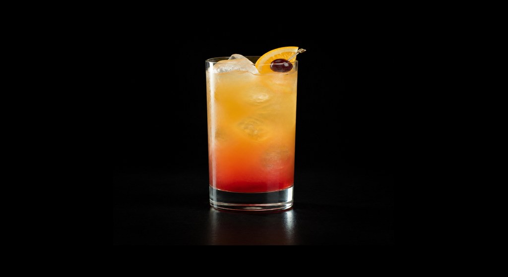 Aegean Sunrise cocktail on a dark studio background