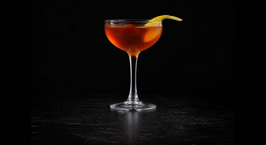 Affinity cocktail on a dark studio background