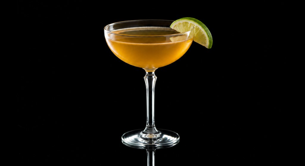 Aged Honey Daiquiri cocktail on a dark studio background