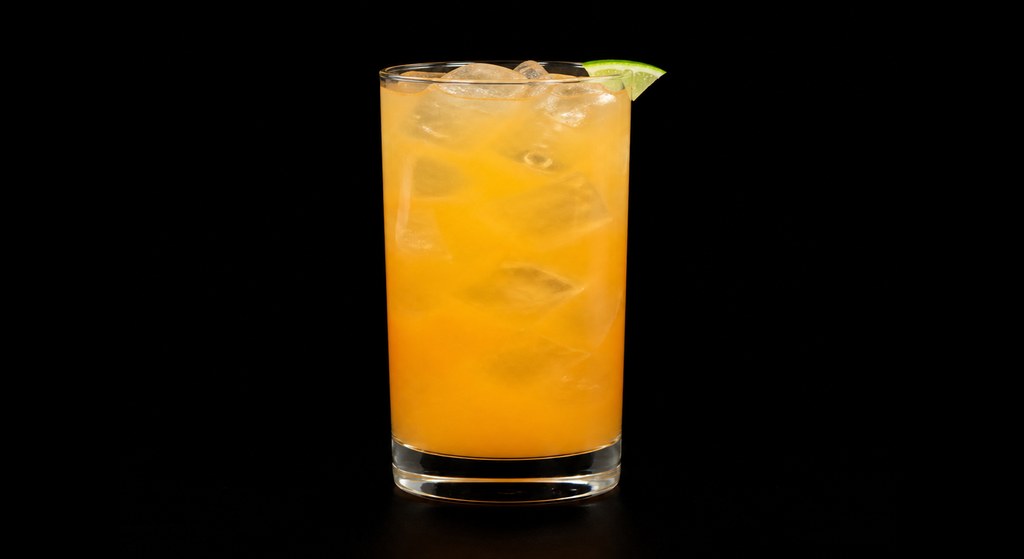 Alamo Splash cocktail on a dark studio background