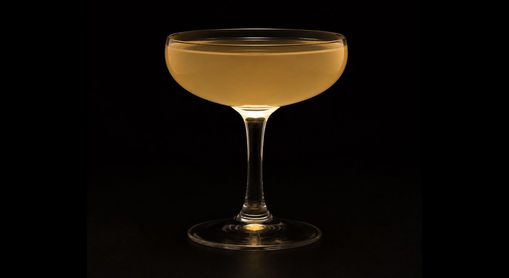 Almond Brother cocktail on a dark studio background