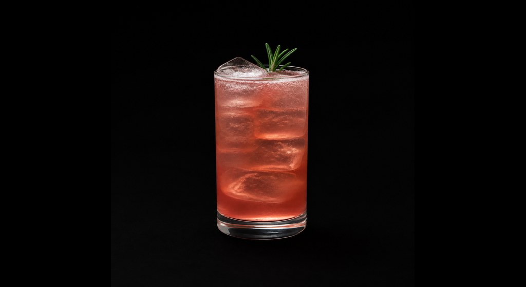 AmeriCollins cocktail on a dark studio background