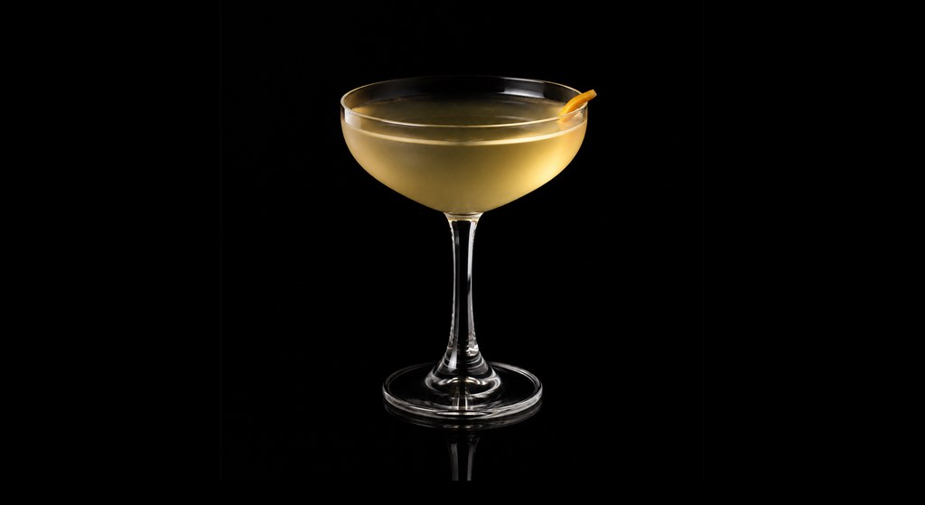Amsterdamage cocktail on a dark studio background