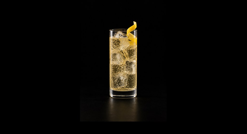 Apple Highball cocktail on a dark studio background