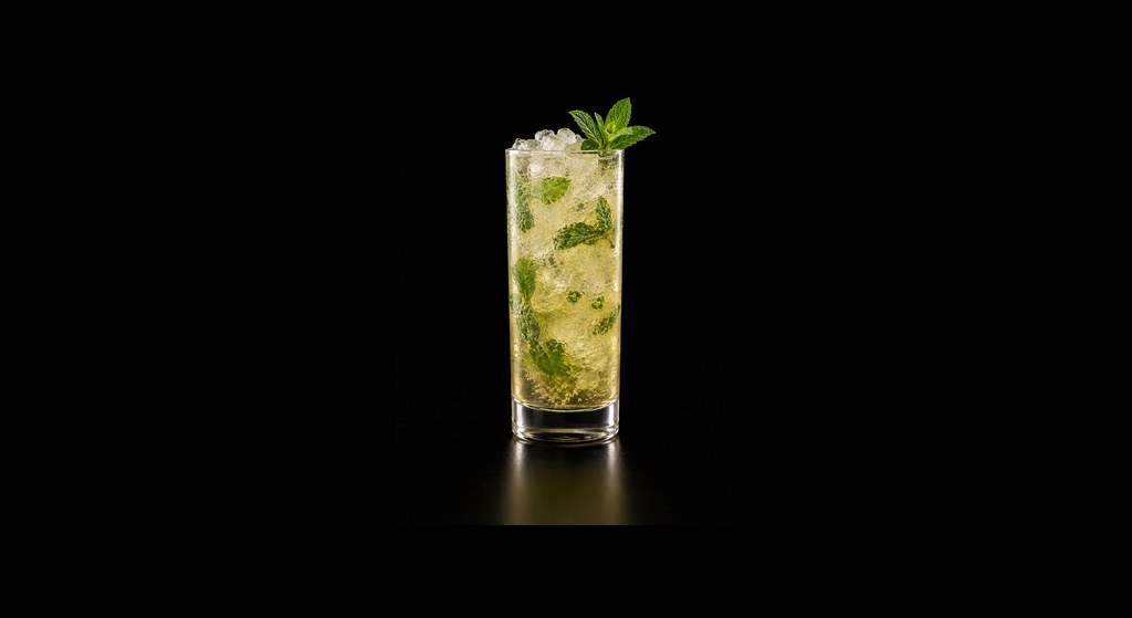 Apple Mojito cocktail on a dark studio background