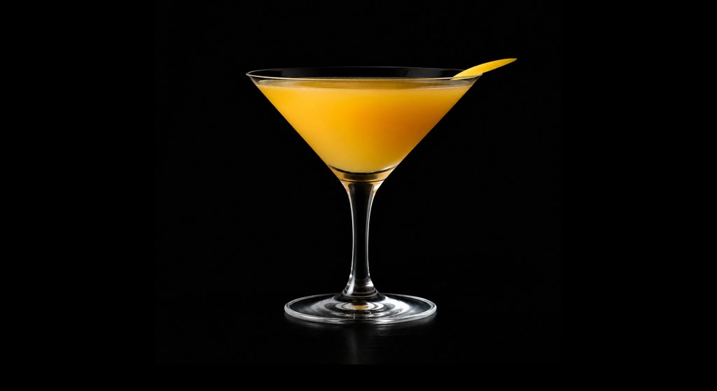 Apricot Mango Cocktail cocktail on a dark studio background