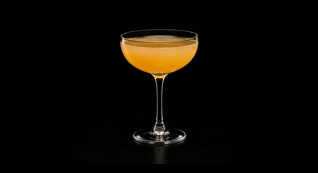 April Shower cocktail on a dark studio background