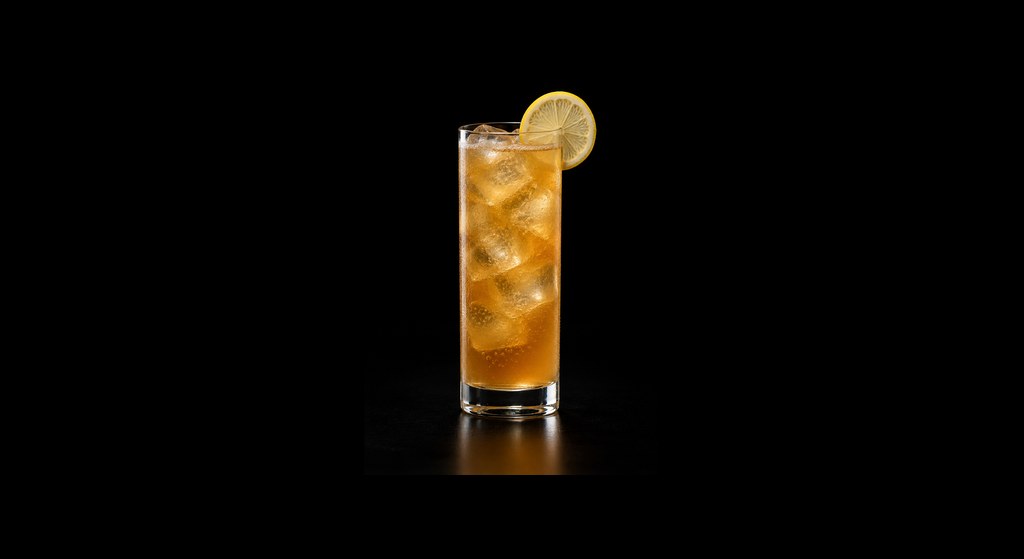 Arnold Palmer cocktail on a dark studio background