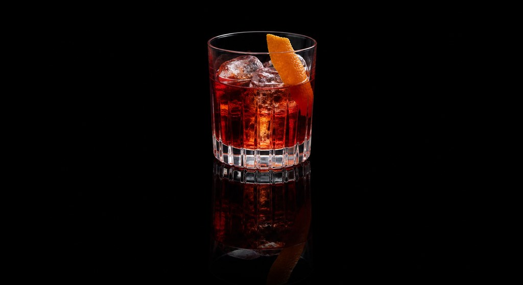 Austin Hartman’s Kingston Negroni cocktail on a dark studio background