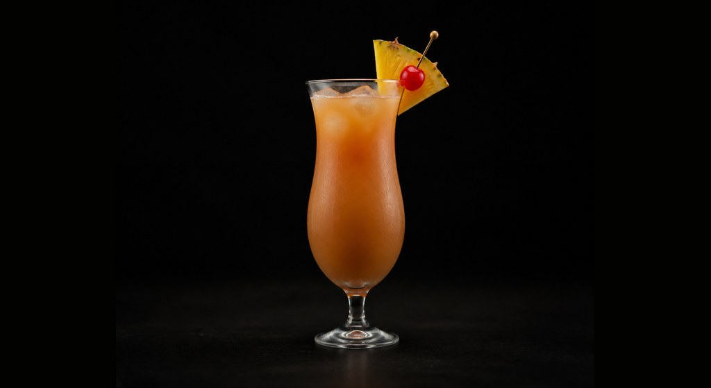 Bahama Mama cocktail on a dark studio background