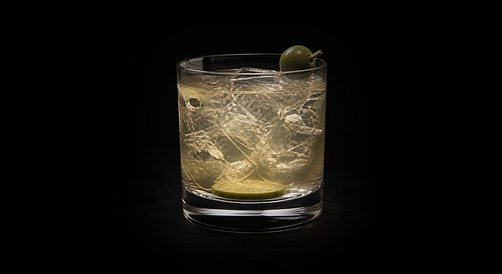 Beach Ball cocktail on a dark studio background