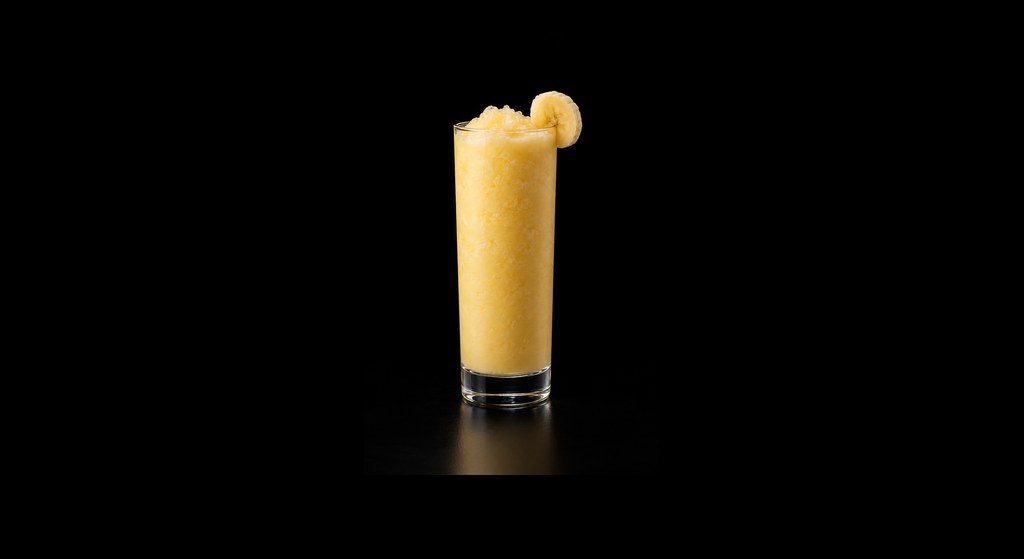 Beach Blonde cocktail on a dark studio background