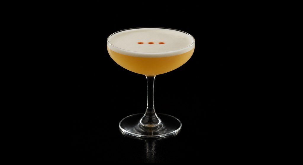 Beretta's Rattlesnake cocktail on a dark studio background