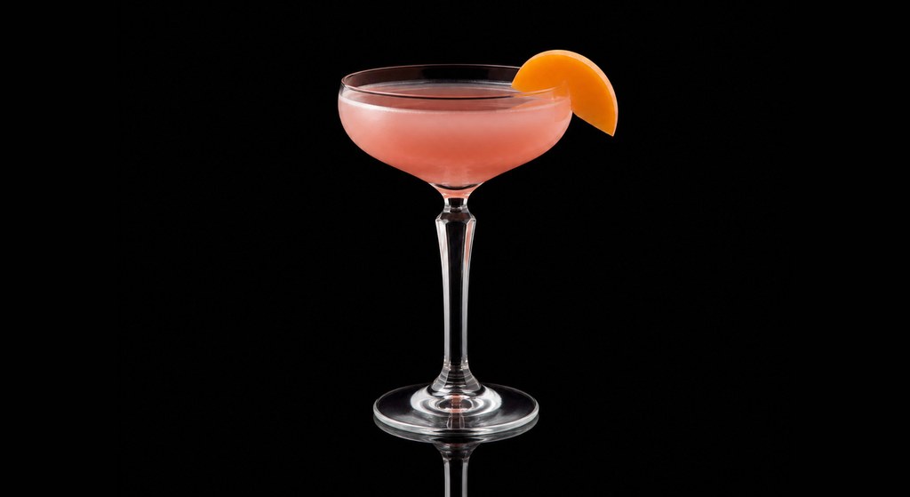 Bermuda Rose cocktail on a dark studio background