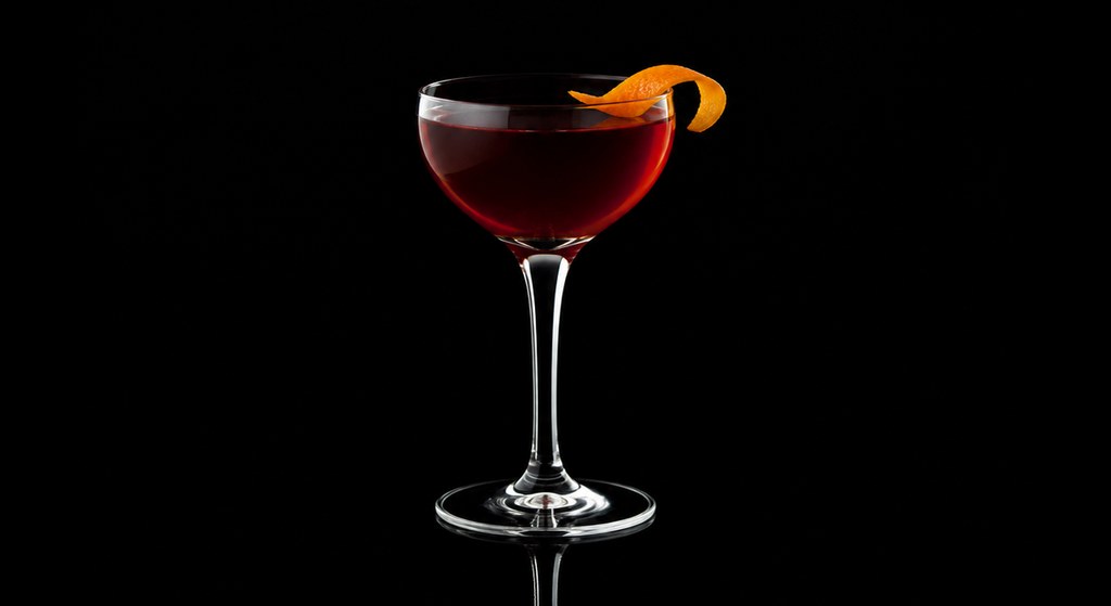 Betsy Ross cocktail on a dark studio background