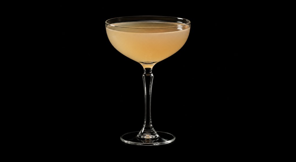 Between-The-Sheets Cocktail cocktail on a dark studio background