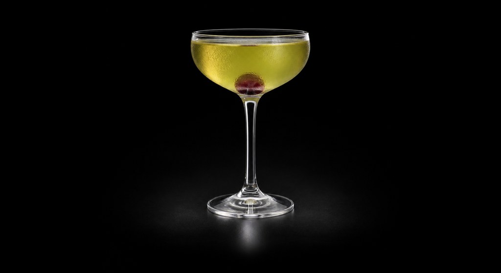 Bijou cocktail on a dark studio background