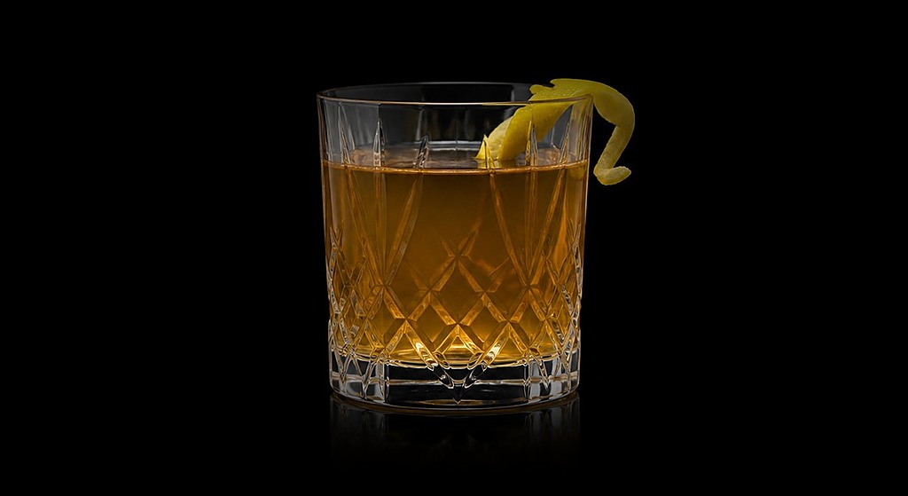 Bitter Giuseppe cocktail on a dark studio background