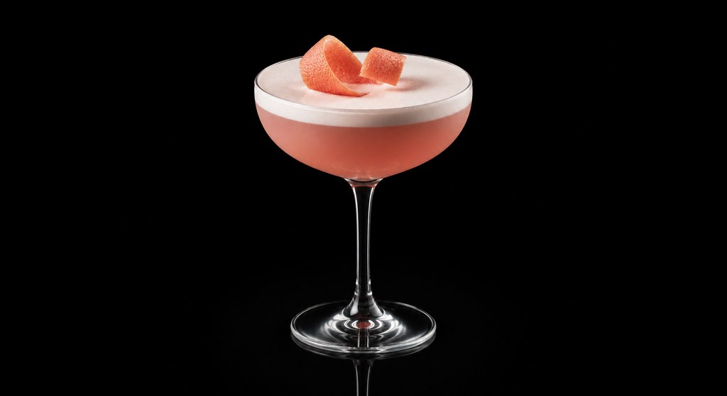 Bitter Lady cocktail on a dark studio background
