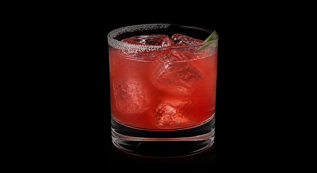 Bitter Margarita cocktail on a dark studio background