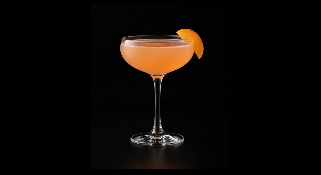 Bittersweet Symphony cocktail on a dark studio background