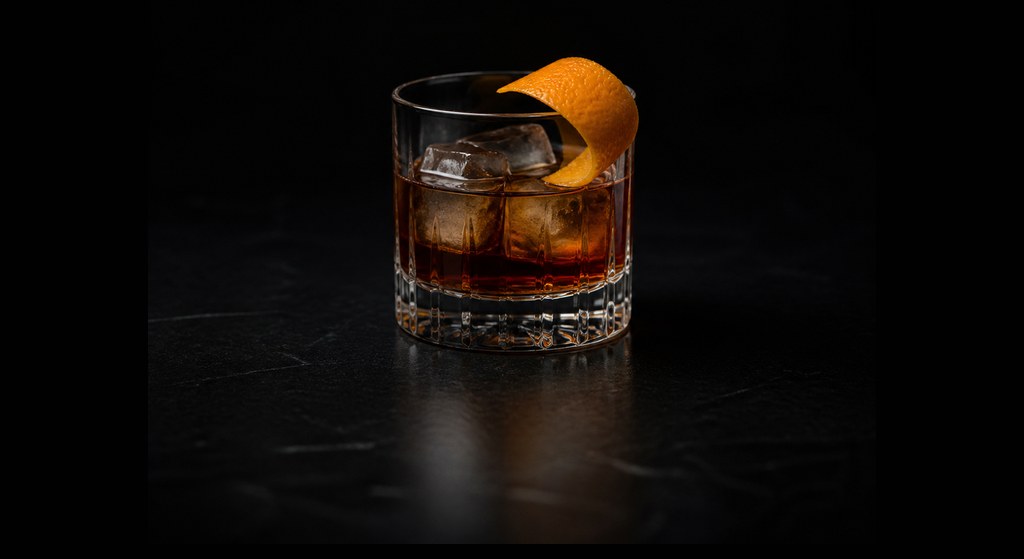 Black Russian cocktail on a dark studio background