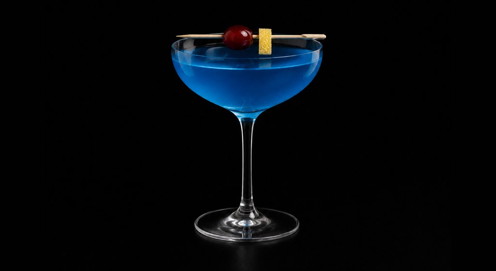 Blue Bird cocktail on a dark studio background