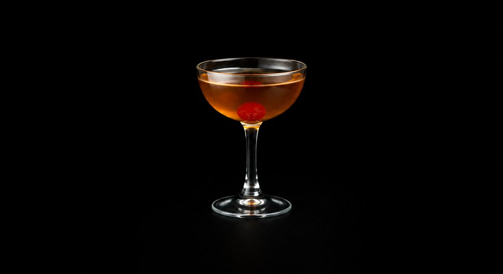 Bold Rob Roy cocktail on a dark studio background