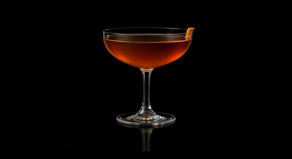 Bonsai cocktail on a dark studio background