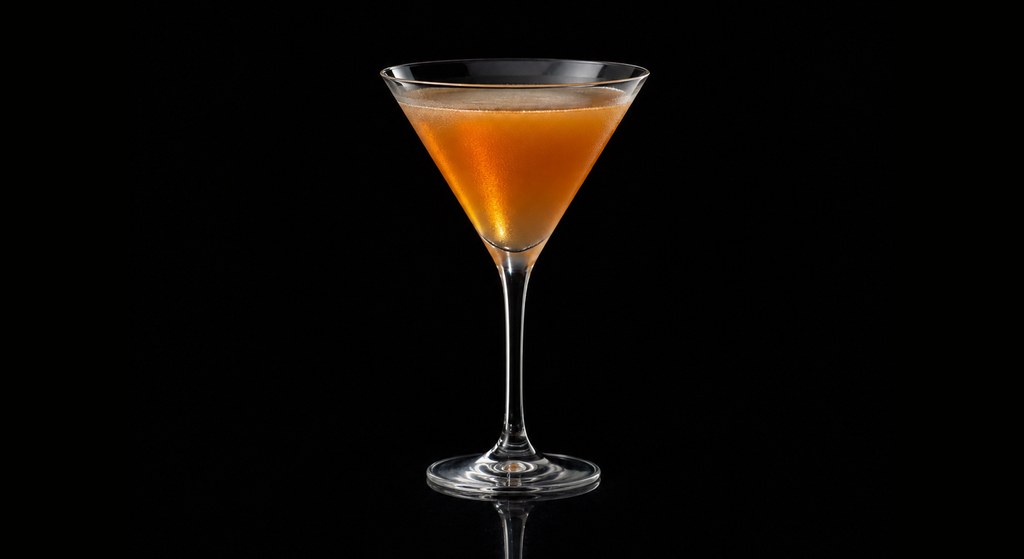 Bourbamaro cocktail on a dark studio background