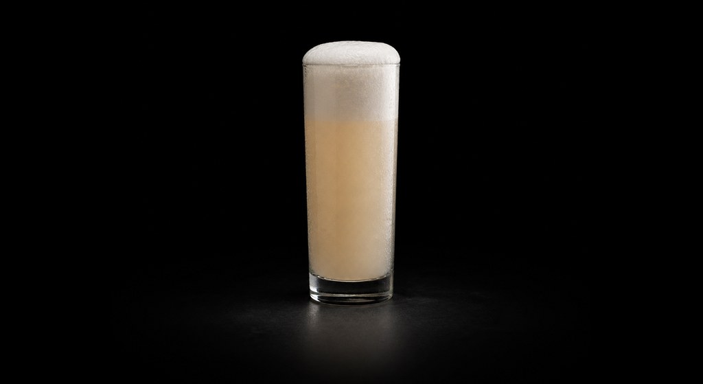 Brandy Lift cocktail on a dark studio background