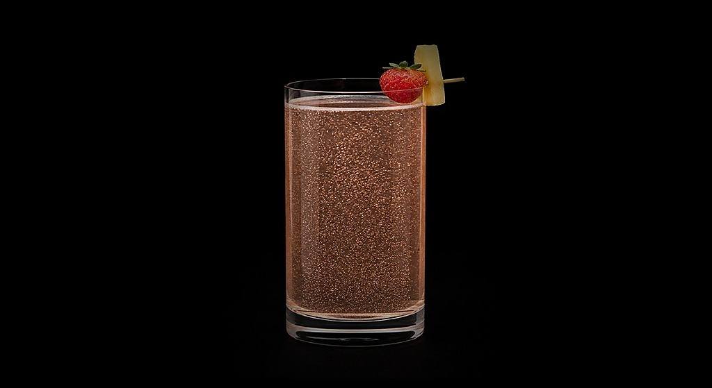 Brandy Squirt cocktail on a dark studio background
