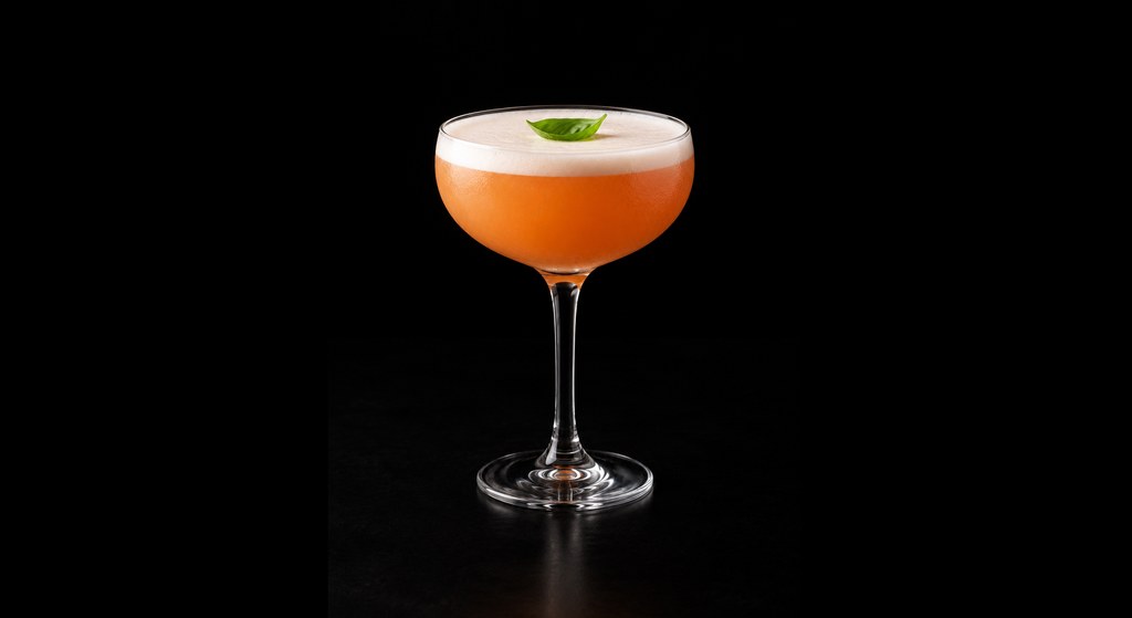 Brazuca Remedy cocktail on a dark studio background