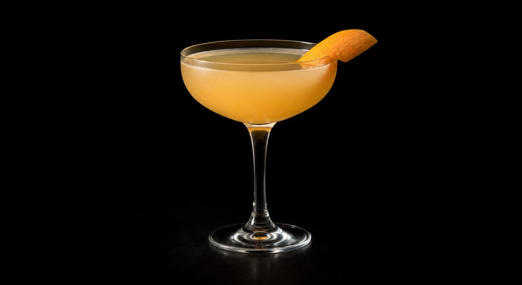 Bronx cocktail on a dark studio background