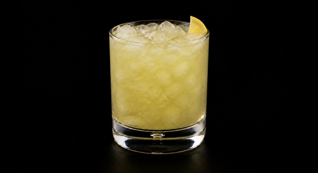 Brunelle Frappé cocktail on a dark studio background