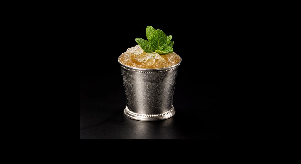 Buster Sword cocktail on a dark studio background