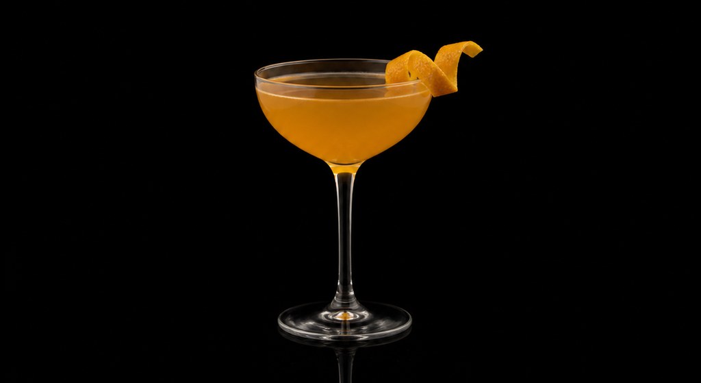 Calvados Cocktail cocktail on a dark studio background