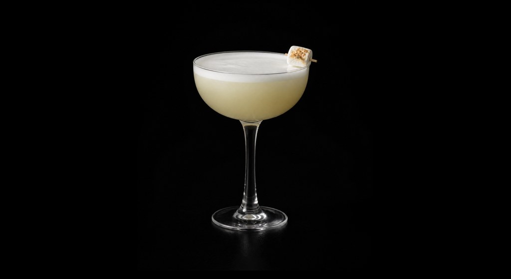 Campfire Sour cocktail on a dark studio background