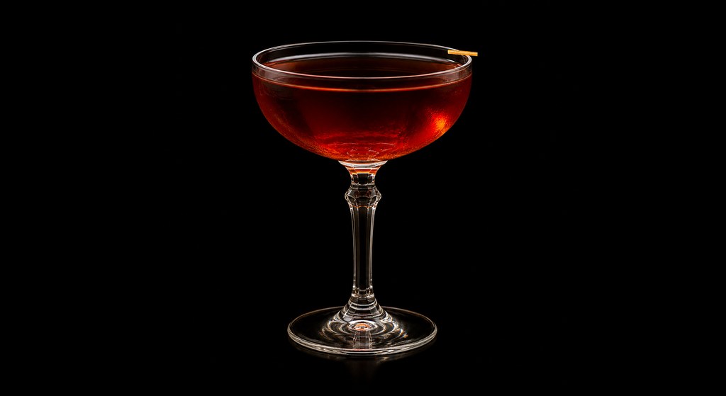 Canadian Cherry cocktail on a dark studio background