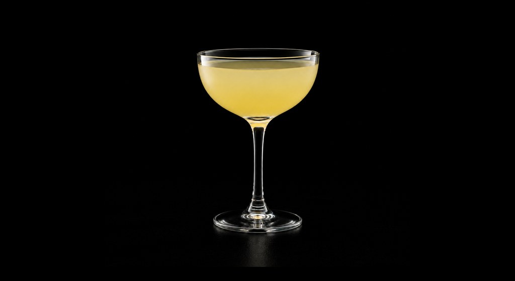 Cane & Table’s Royal Hawaiian cocktail on a dark studio background