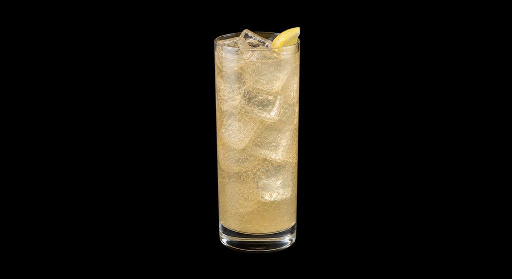 Canton Shandy cocktail on a dark studio background