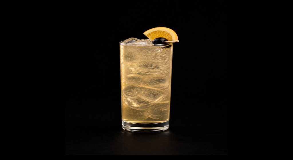Captain Collins cocktail on a dark studio background