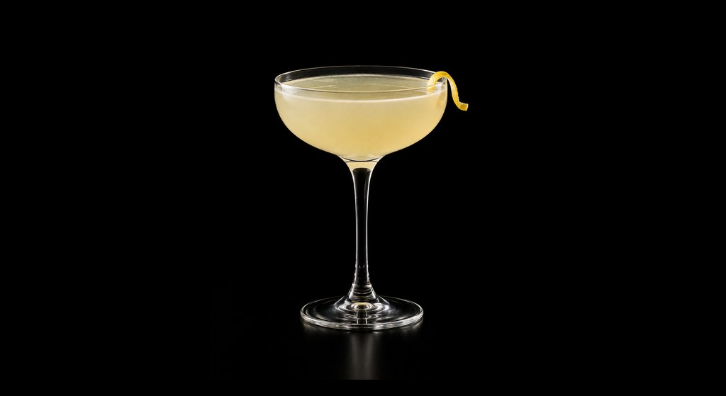 Cardamom & Lemon Gimlet cocktail on a dark studio background