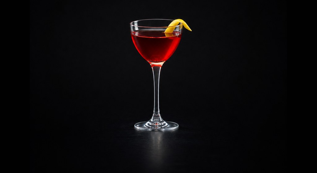 Cardinale cocktail on a dark studio background