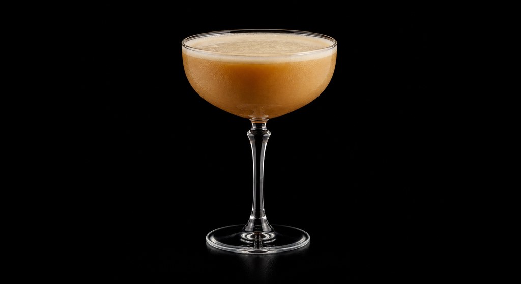 Chateau Briand's Rum Cow cocktail on a dark studio background