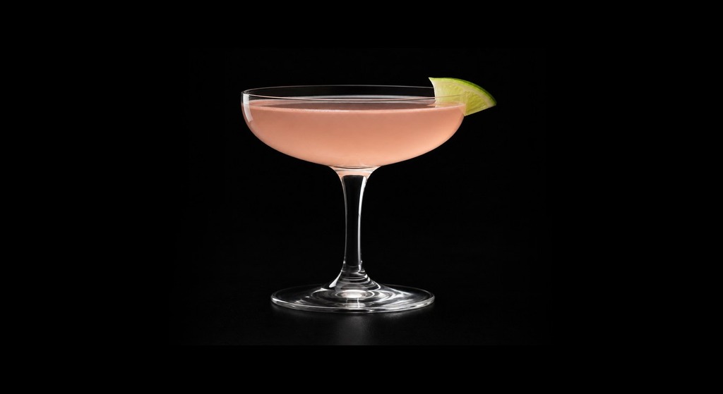 Cherry Bomb Gimlet cocktail on a dark studio background